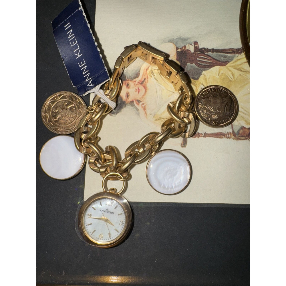 Anne Klein Gold Tone White Jade Cioin Charm Watch